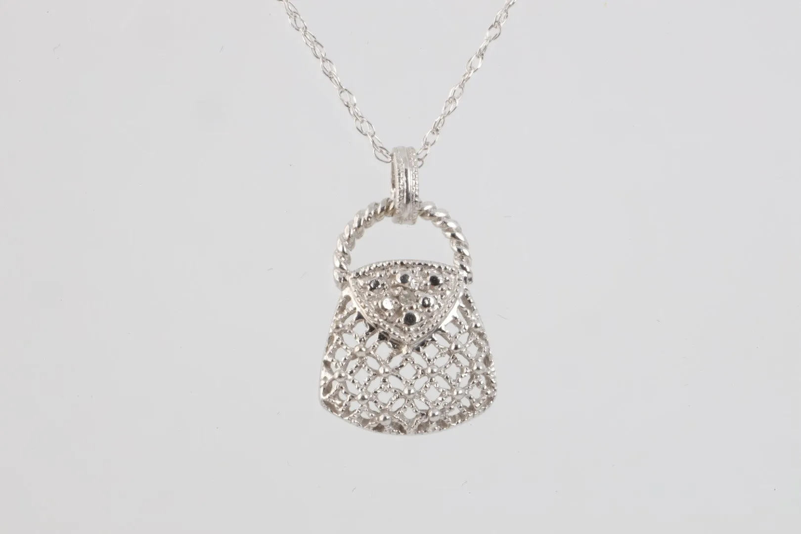 18.5" 10k White Gold Crystal Purse Pendant Necklace (1.40g.)