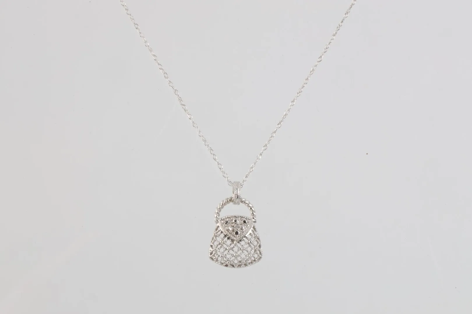 18.5" 10k White Gold Crystal Purse Pendant Necklace (1.40g.)